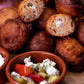 Hartige oliebollen met feta, olijven en zongedroogde tomaatjes